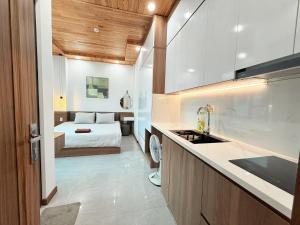 Kuchyň nebo kuchyňský kout v ubytování Hasa Đà Lạt Hotel