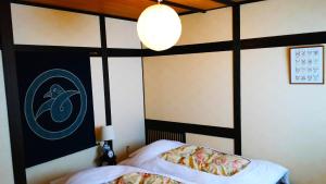 Cama o camas de una habitación en Rickshaw inn