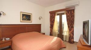 TV a/nebo společenská místnost v ubytování Olympia Guesthouse + 27 fotografií