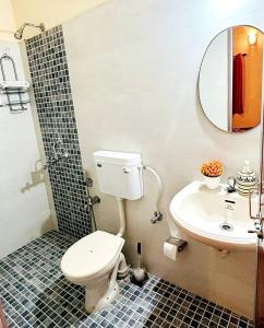 Koupelna v ubytování Reevs Homestay, Luxury 2 Bedroom apartment + 14 fotografií