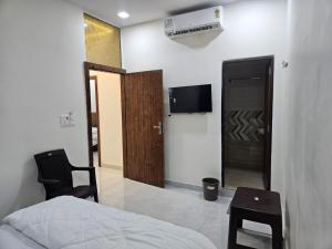 Televisyen dan/atau pusat hiburan di Bright Stay Retreat