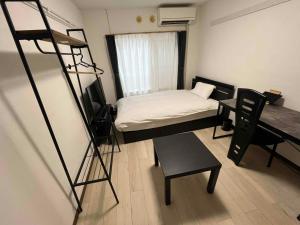 Postel nebo postele na pokoji v ubytování Good for long stay! Blossom Garden 103 #KT2