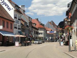 an empty street in a town with buildings at Sonnenterrasse in Elzach