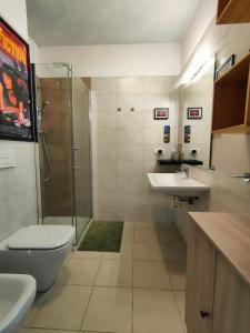 a bathroom with a shower and a toilet and a sink at Soul Stay Milano - San Siro Ippodromo Bonola M1 in Milan