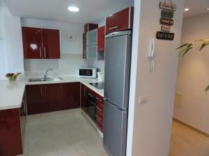 Kuchyň nebo kuchyňský kout v ubytování Apartment Poris Sunrises