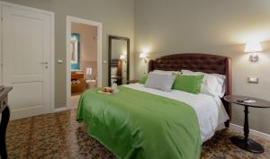 Säng eller sängar i ett rum på Hotel Moderno