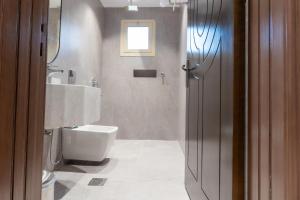 Koupelna v ubytování افاق الصفوة للشقق المخدومه afaq alsafwa serviced apartments + 8 fotografií