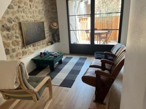 Χώρος καθιστικού στο Maison de village au cœur de Ampus