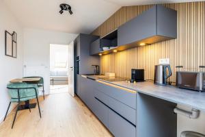 Η κουζίνα ή μικρή κουζίνα στο GoldenKey Suites