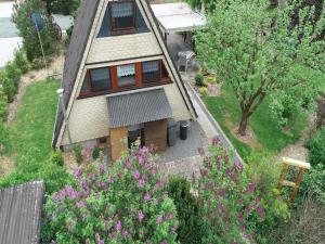 an aerial view of a house with trees and flowers at Ferienhaus Christina in Medebach +29 photos