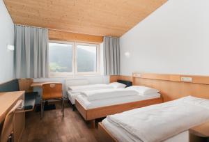 Ένα ή περισσότερα κρεβάτια σε δωμάτιο στο St Michael Alpin Retreat +41 φωτογραφίες