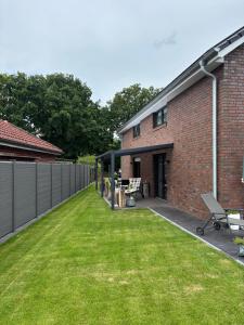 Κήπος έξω από το -33- Exklusive FeWo Papenburg - Westoverledingen - Grenzweg - +8 φωτογραφίες