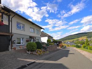 a house with a view of a mountain at Modern Escape in Niedersfeld in Winterberg