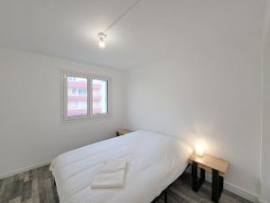 Katil atau katil-katil dalam bilik di Sofia - grand appartement convivial