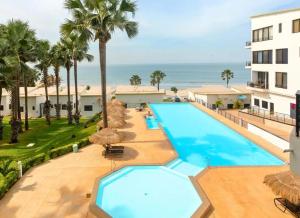 an image of a swimming pool at a resort at Relax Ocean Views in Bijilo