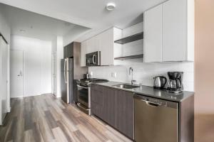 Kuchyň nebo kuchyňský kout v ubytování Blueground Downtown rooftop nr Marymoor Park SEA-896 + 23 fotografií