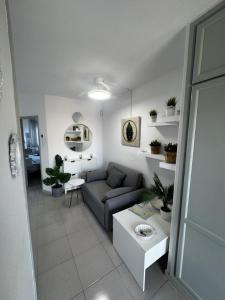 a living room with a couch and a table at Tagora del Guayero in Los Cristianos