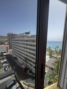 a view of a hotel with the ocean in the background at Tagora del Guayero in Los Cristianos