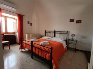 Ένα ή περισσότερα κρεβάτια σε δωμάτιο στο La Ferula Bed&Pool +29 φωτογραφίες