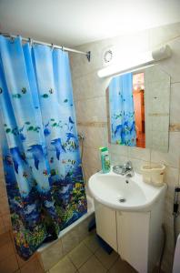 Koupelna v ubytování Fortuna Apartments + 37 fotografií