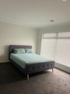 Ένα ή περισσότερα κρεβάτια σε δωμάτιο στο Holiday Home