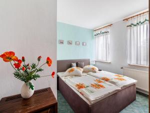 Katil atau katil-katil dalam bilik di idyllische Ferienwohnung in Lichtenhain