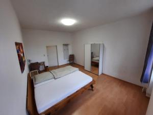 En eller flere senge i et værelse på Landzeit Niedergräfenhain