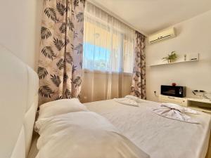 Ένα ή περισσότερα κρεβάτια σε δωμάτιο στο Menada Apartments in Cascadas +48 φωτογραφίες