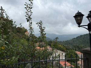 a street light and a view of a mountain at Villa Marcelle in Evisa