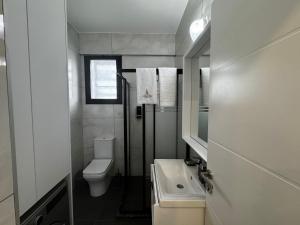 Koupelna v ubytování Gerçek Residence Girne + 21 fotografií