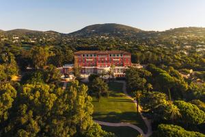 an aerial view of a large building with trees at COMO Le Beauvallon - Golfe de Saint-Tropez in Grimaud +59 photos