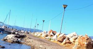 a row of sailboats are docked on the water at Thalassa View c2 in Khalkoútsion