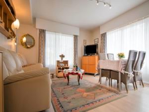 Μια τηλεόραση ή/και κέντρο ψυχαγωγίας στο Cozy Stay by the North Sea