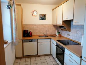 Kuhinja ili čajna kuhinja u objektu Garden Stay in Steingaden