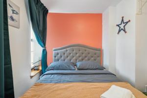 Postel nebo postele na pokoji v ubytování Spacious 4BR Stay in Lower Manhattan