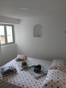 Postel nebo postele na pokoji v ubytování Maison corse - cap corse