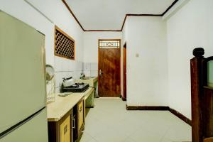 Фотография из галереи Belvilla Bogor near Citra Alam Riverside formerly Jatimas Hijau в городе Богор