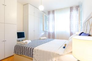Posteľ alebo postele v izbe v ubytovaní Apartment Mandalina