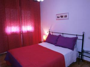 Postel nebo postele na pokoji v ubytování Hostal Don Pepe