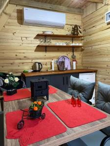 Posezení v ubytování Lelvani Deluxe Bungalow