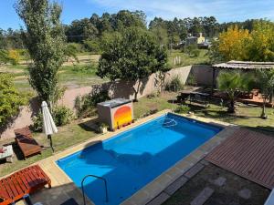 an overhead view of a swimming pool in a yard at Los Aromos in Federación