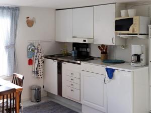 Kuchyň nebo kuchyňský kout v ubytování 2 person holiday home in Falkenberg + 7 fotografií