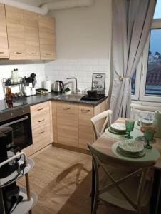 Η κουζίνα ή μικρή κουζίνα στο Apartment in the heart of the city