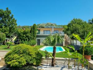 an image of a house with a swimming pool at White villa in Esztergom