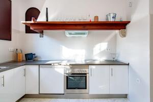 Kuchyň nebo kuchyňský kout v ubytování 16th-Century Masia with Pool and Chapel + 52 fotografií