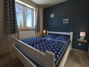 Postel nebo postele na pokoji v ubytování Cottage near High Fens Nature Park