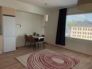 Η κουζίνα ή μικρή κουζίνα στο Kotimaailma - Cosy 3BR apartment for 5