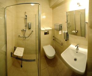Kúpeľňa v ubytovaní Hotel Zawisza