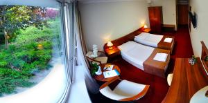 Posedenie v ubytovaní Hotel Zawisza