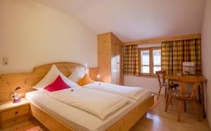 Letto o letti in una camera di Wanishof